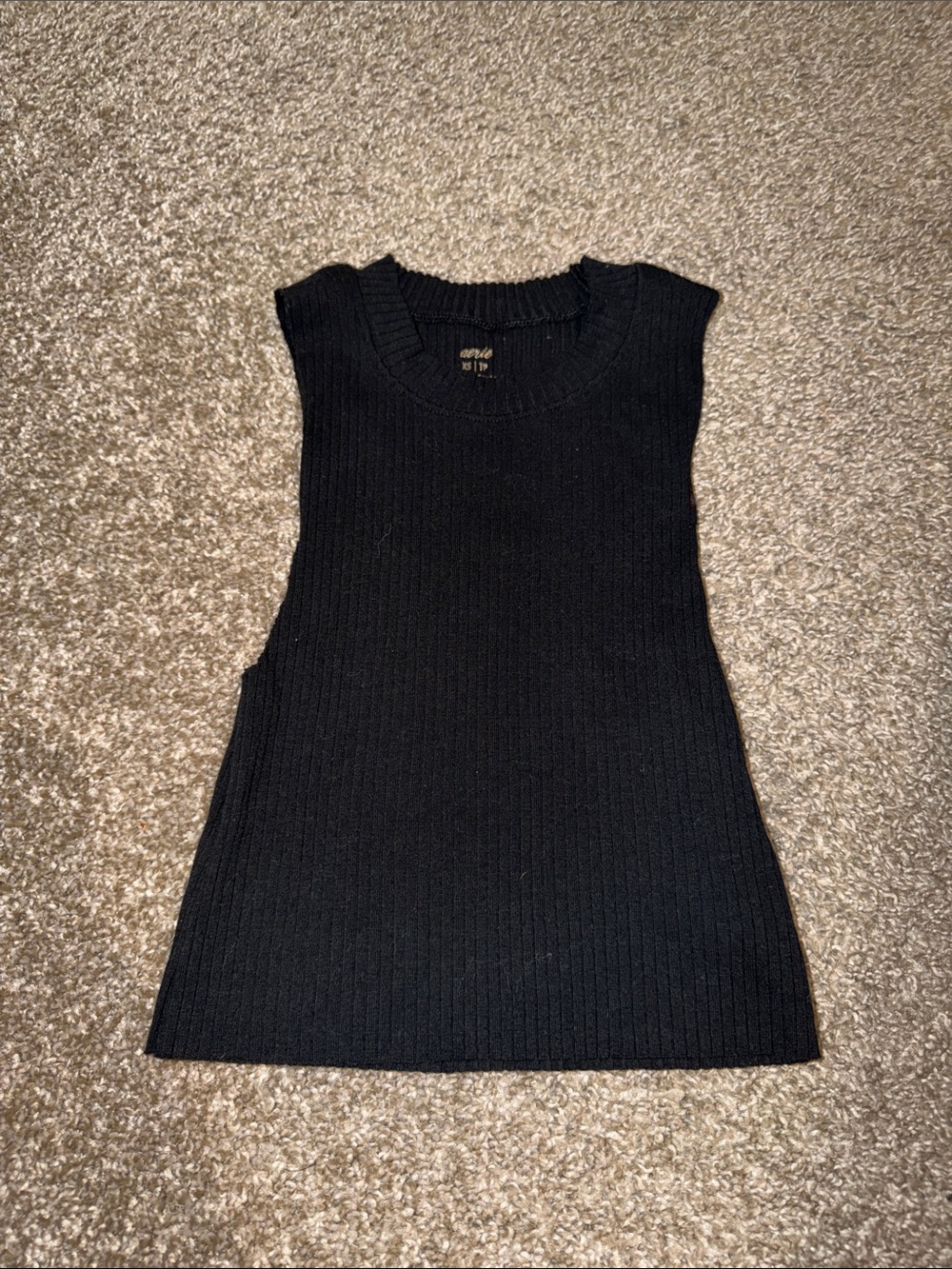 Sleeveless Black Ribbed Knit Top